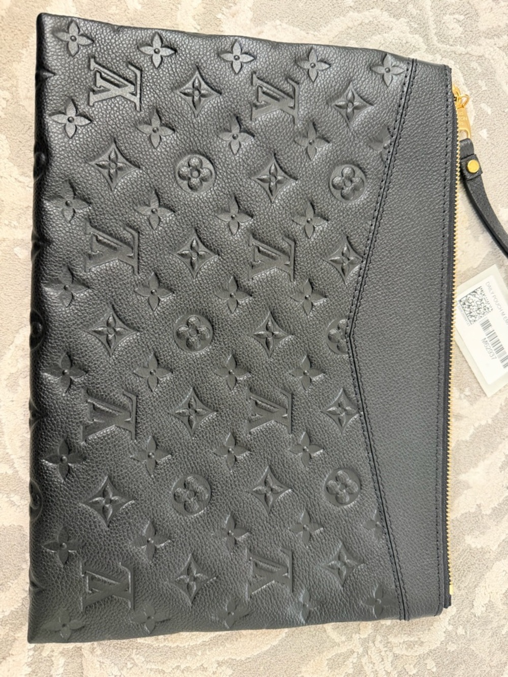 Louis Vuitton Black Embossed Monogram Pouch with Gold Accents - Picture 2 of 4